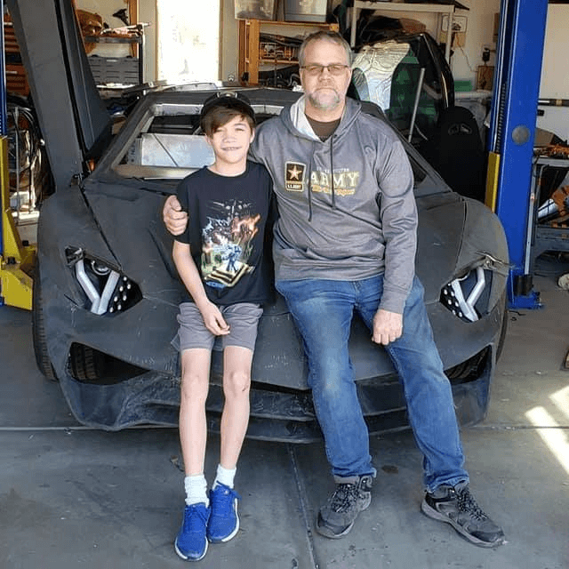 Sterling, Xander and their supercar model of Aventador