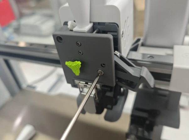 Tighten the three screws