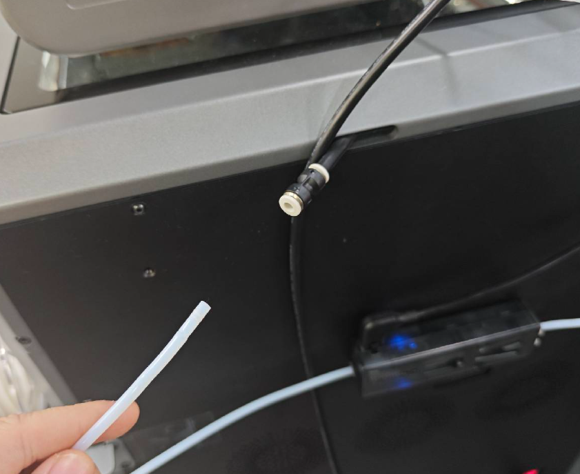 plug out the PTFE tube (teflon tube)