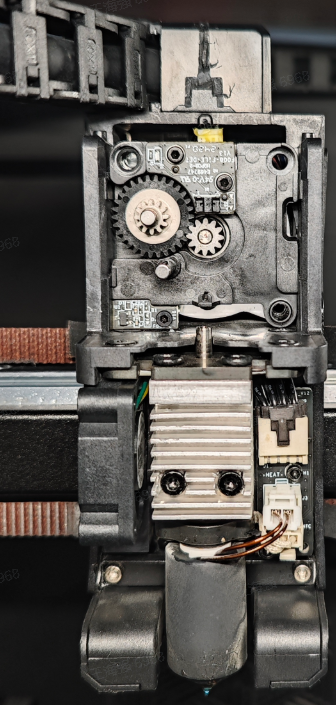 Press the extruder compression block