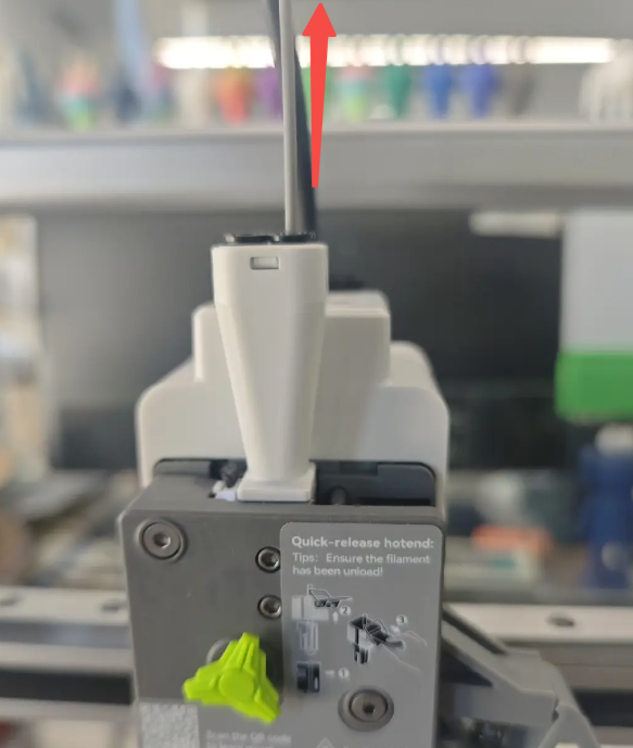 slowly pull out the filament