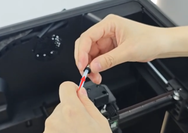 Thread the PTFE tube through the tube connector