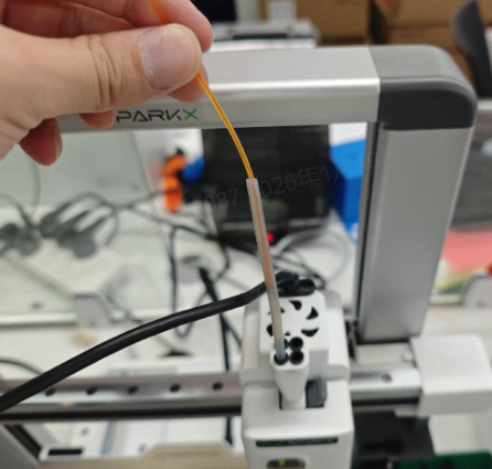 Remove the extruder front cover