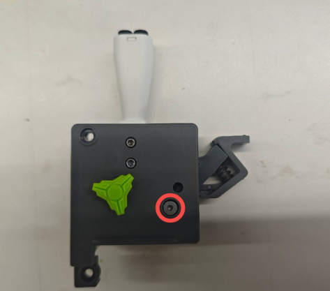 Reinstall the new extruder front housing