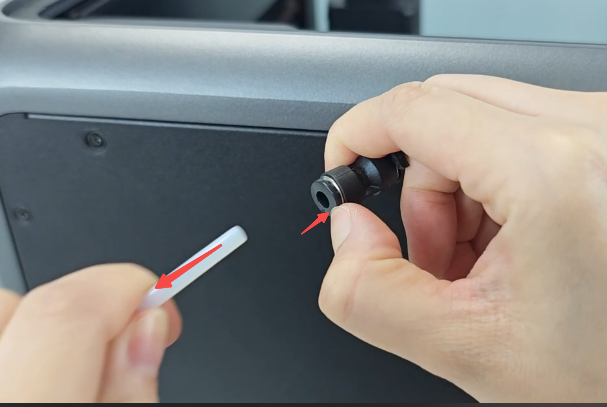 Remove the short PTFE tube