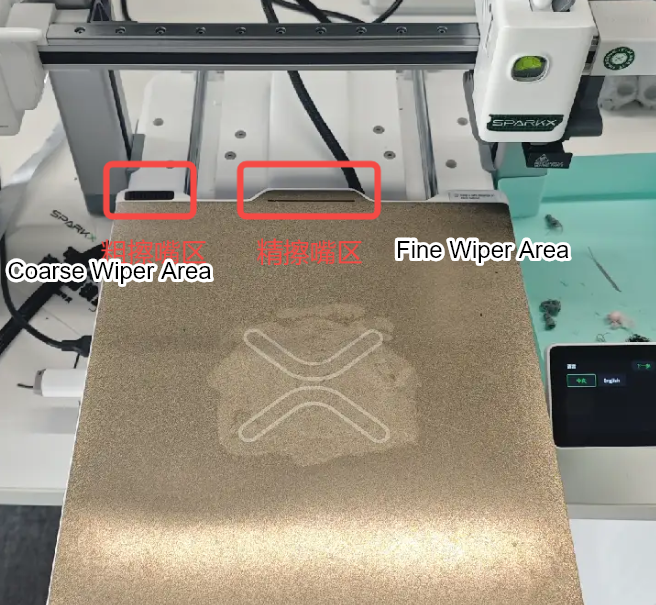 Nozzle Wiping Assembly