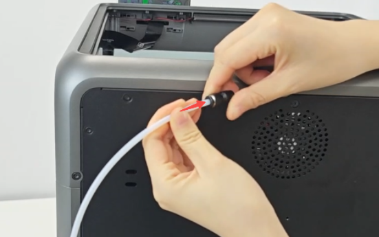Insert the short PTFE tube