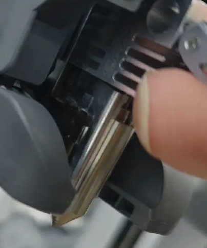 insert the hotend horizontally into the heating assembly