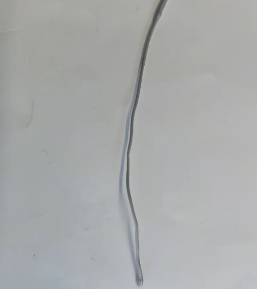 Inspect the pulled-out filament